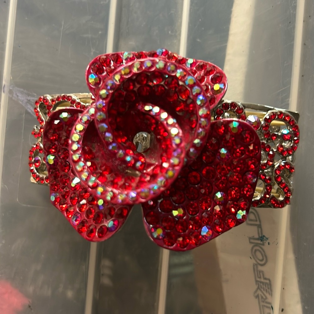 Red rose on silver stretch band